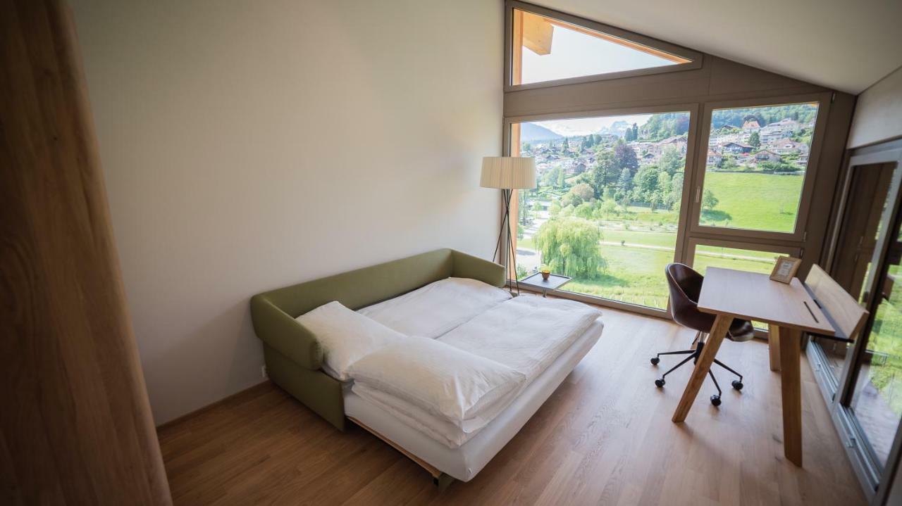 Seaside-Lodge, Top Apartment Spiez Bagian luar foto